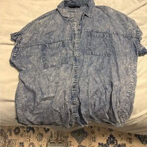 Woman’s acid wash Denim button up